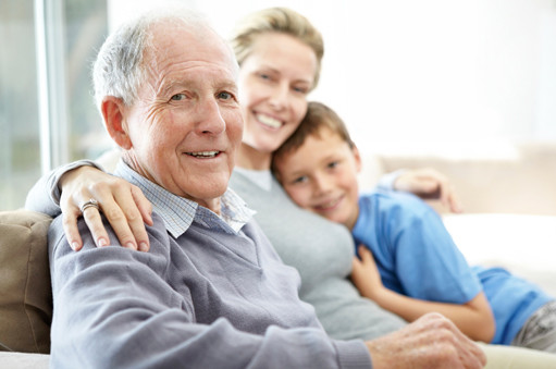 Photo: Elderly man with adult daughter and grandson